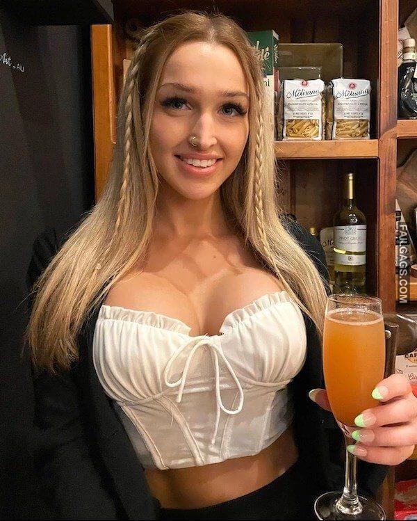 Cute Busty Girl in Corset Showing Deep Cleavage 5
